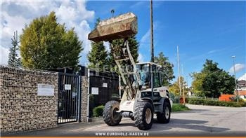 Terex TL 65, Radlader, Schnellwechsler, Zusatzhydraulik - Gumikerekes homlokrakodó: 1 kép. Terex TL 65, Radlader, Schnellwechsler, Zusatzhydraulik - Gumikerekes homlokrakodó: 1 kép.