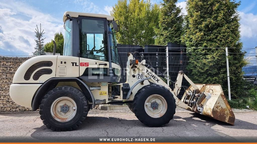 Terex TL 65, Radlader, Schnellwechsler, Zusatzhydraulik - Gumikerekes homlokrakodó: 4 kép. Terex TL 65, Radlader, Schnellwechsler, Zusatzhydraulik - Gumikerekes homlokrakodó: 4 kép.