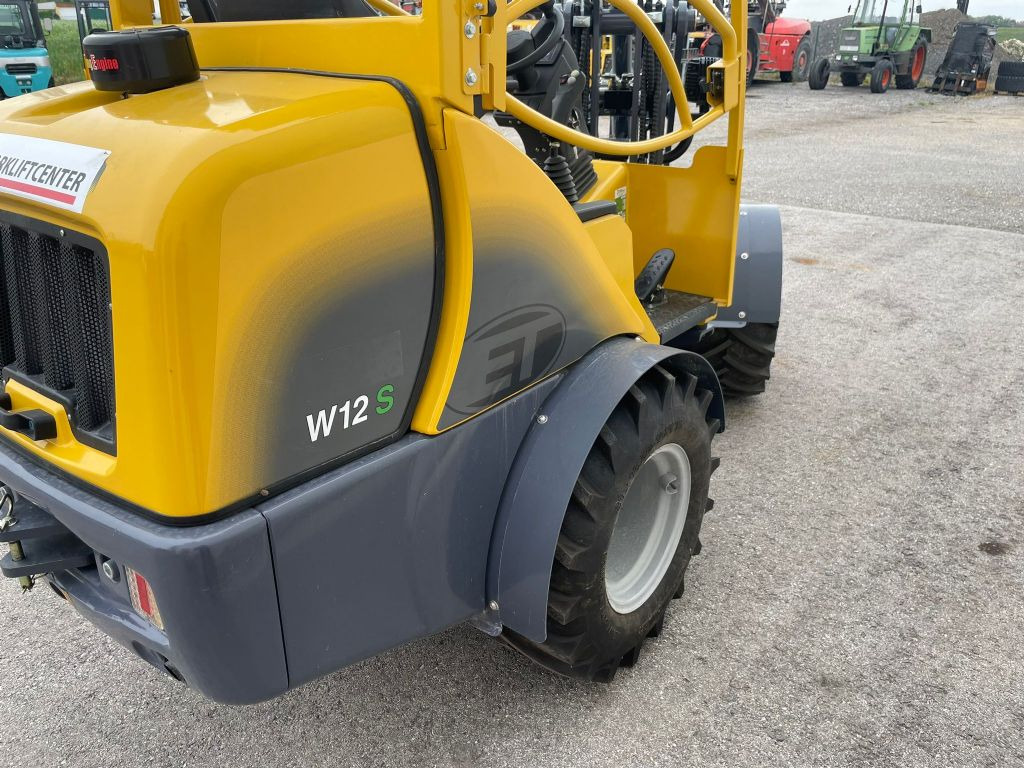 Eurotrac Eurotrac 820/W12S - Gumikerekes homlokrakodó: 5 kép. Eurotrac Eurotrac 820/W12S - Gumikerekes homlokrakodó: 5 kép.