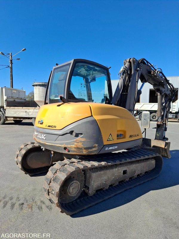 Pelle sur chenilles MECALAC 8MCR - 6920 heures - 2014 - N° série 130951 - Lánctalpas kotró: 3 kép. Pelle sur chenilles MECALAC 8MCR - 6920 heures - 2014 - N° série 130951 - Lánctalpas kotró: 3 kép.