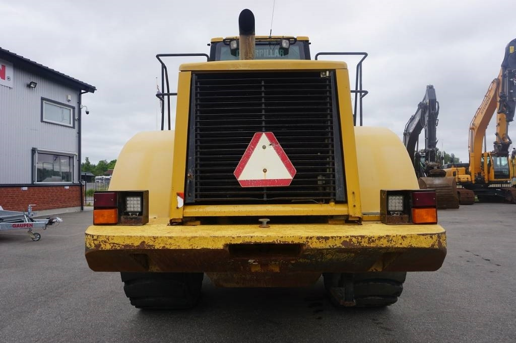 CAT 966 G I - Gumikerekes homlokrakodó: 4 kép. CAT 966 G I - Gumikerekes homlokrakodó: 4 kép.