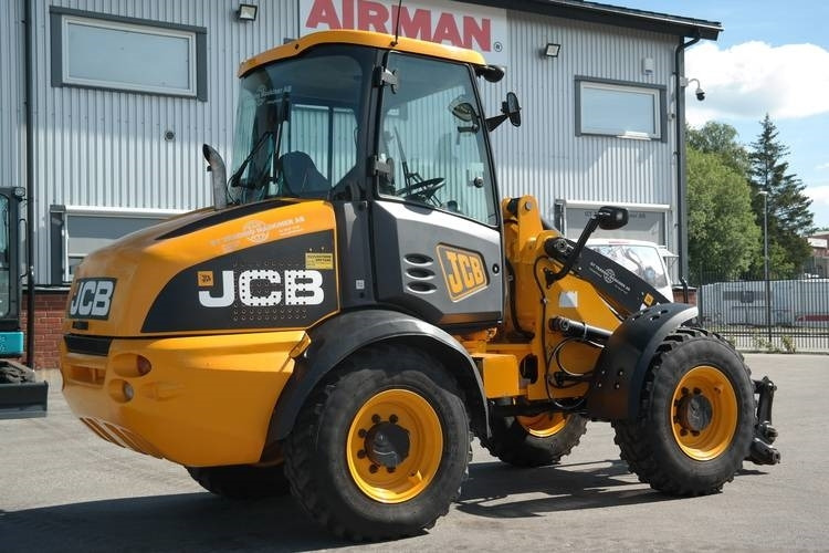 JCB 409ZX - Gumikerekes homlokrakodó: 5 kép. JCB 409ZX - Gumikerekes homlokrakodó: 5 kép.