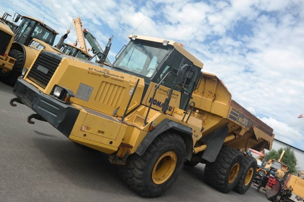 Komatsu HM 300-2 - Csuklós dömper: 4 kép. Komatsu HM 300-2 - Csuklós dömper: 4 kép.