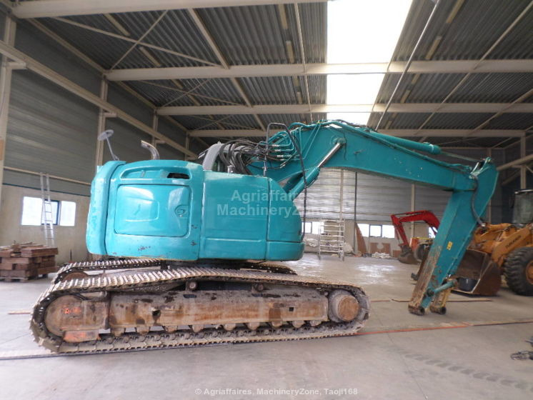New Holland Kobelco Kobelco E 235 BSR-2 E 235 BSR-2 - Lánctalpas kotró: 2 kép. New Holland Kobelco Kobelco E 235 BSR-2 E 235 BSR-2 - Lánctalpas kotró: 2 kép.