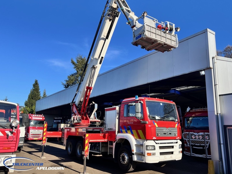 MAN TGA 26.350 Magirus ALP 320L = 32 meter, Waterpump, 6x4, Steel springs - Teherautó: 2 kép. MAN TGA 26.350 Magirus ALP 320L = 32 meter, Waterpump, 6x4, Steel springs - Teherautó: 2 kép.