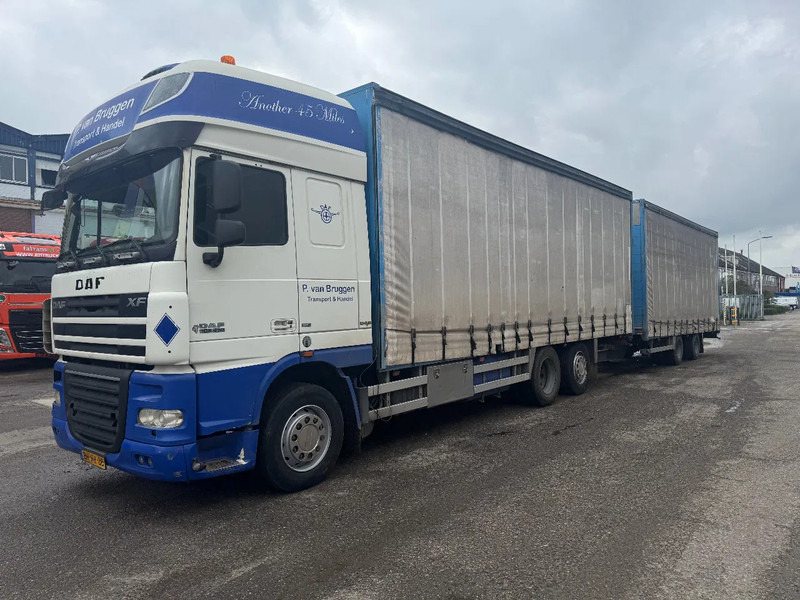 DAF XF 105.410 6X2 EURO 5 + GROENEWEGEN HANGER - Ponyvás teherautó: 1 kép. DAF XF 105.410 6X2 EURO 5 + GROENEWEGEN HANGER - Ponyvás teherautó: 1 kép.