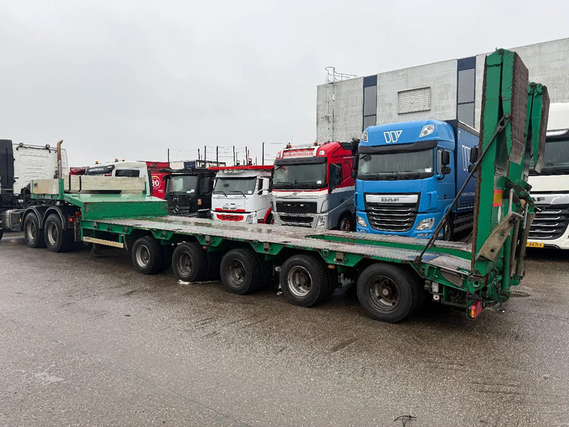 Goldhofer STZ-H5,5 ACLE, 3 AXLE FORCED STEERING, DOUBLE HYDRAULIC RAMPS, TUV TILL 11-11-2026 - Félpótkocsi mélybölcsős: 2 kép. Goldhofer STZ-H5,5 ACLE, 3 AXLE FORCED STEERING, DOUBLE HYDRAULIC RAMPS, TUV TILL 11-11-2026 - Félpótkocsi mélybölcsős: 2 kép.