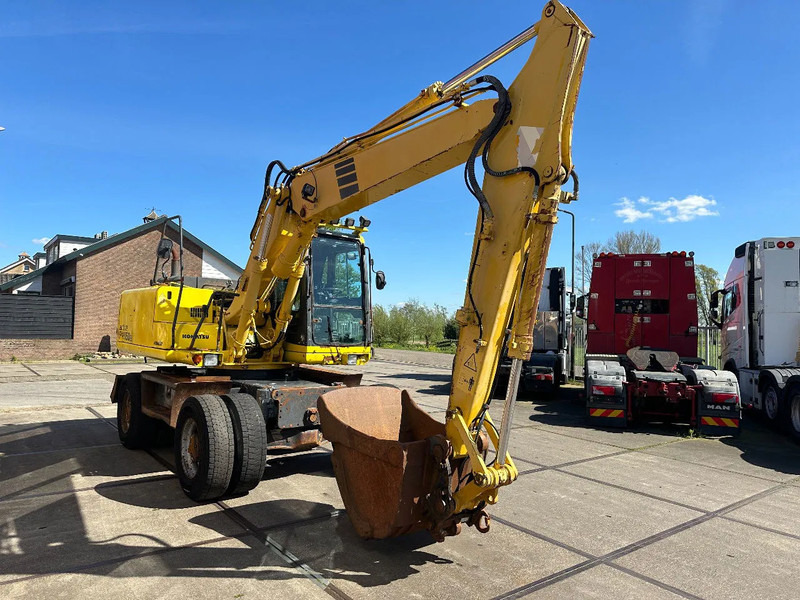 Komatsu PW150ES-6K CE - Gumikerekes kotró: 4 kép. Komatsu PW150ES-6K CE - Gumikerekes kotró: 4 kép.