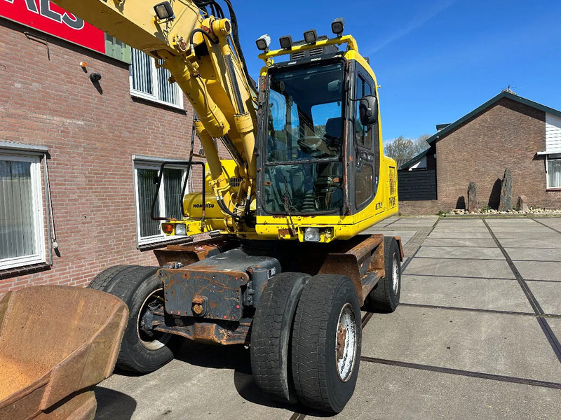 Gumikerekes kotró Komatsu PW150ES-6K CE: 10 kép.