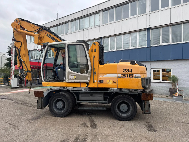 Liebherr A 316 LITRONIC CABIN HIGH CE - Hulladék kotró: 3 kép. Liebherr A 316 LITRONIC CABIN HIGH CE - Hulladék kotró: 3 kép.