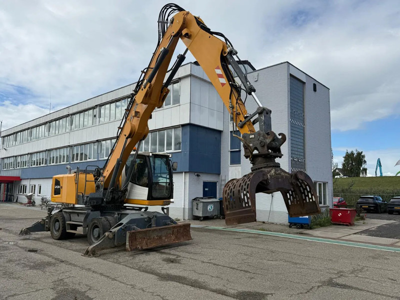 Liebherr LH 24 M LITRONIC DUTCH REGISTRATION LANDBOUW KENTEKEN - Hulladék kotró: 1 kép. Liebherr LH 24 M LITRONIC DUTCH REGISTRATION LANDBOUW KENTEKEN - Hulladék kotró: 1 kép.
