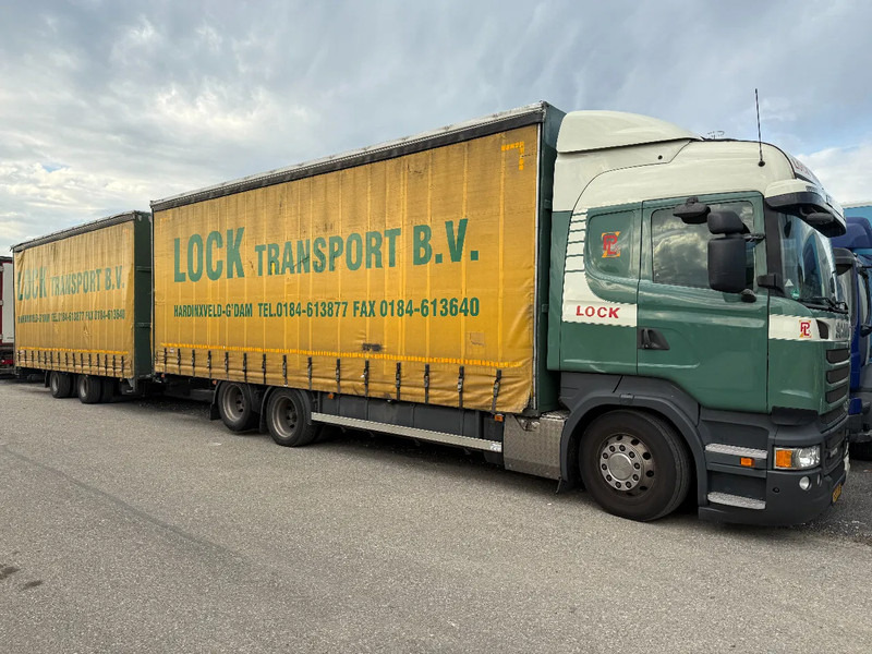 Scania R450 6X2 + DRACO AANHANGER 2010 TUV TILL 17-08-2026 - Ponyvás teherautó: 1 kép. Scania R450 6X2 + DRACO AANHANGER 2010 TUV TILL 17-08-2026 - Ponyvás teherautó: 1 kép.