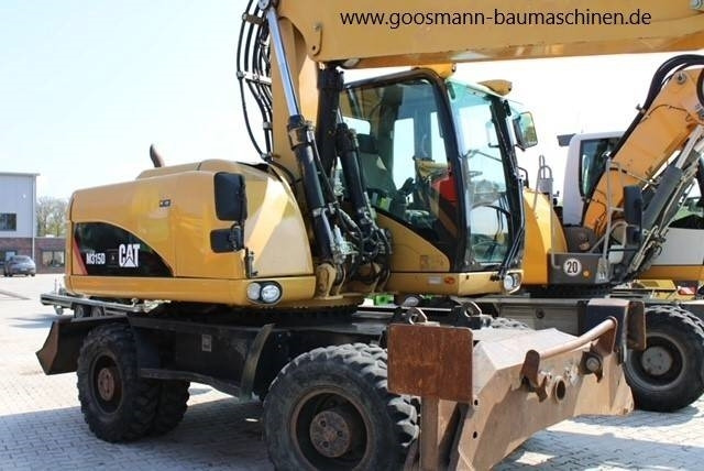 CAT M 315D - Gumikerekes kotró: 4 kép. CAT M 315D - Gumikerekes kotró: 4 kép.