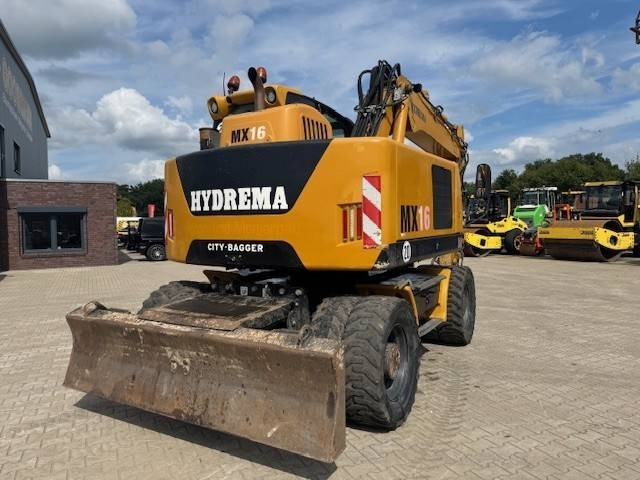 Hydrema MX 16 - Gumikerekes kotró: 3 kép. Hydrema MX 16 - Gumikerekes kotró: 3 kép.