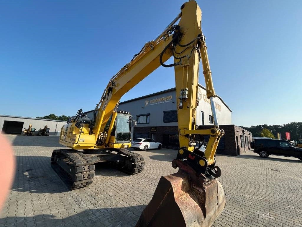 KOMATSU PC210 LC-11 - Lánctalpas kotró: 2 kép. KOMATSU PC210 LC-11 - Lánctalpas kotró: 2 kép.