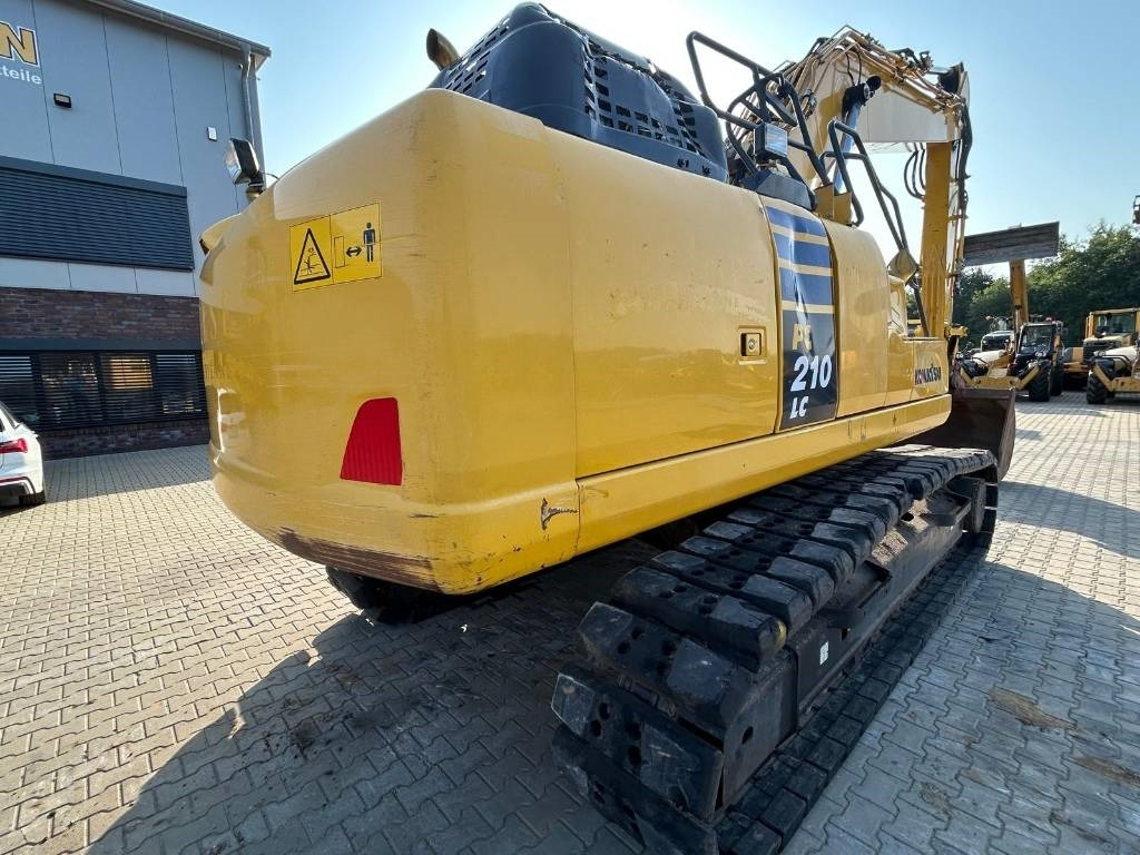 KOMATSU PC210 LC-11 - Lánctalpas kotró: 5 kép. KOMATSU PC210 LC-11 - Lánctalpas kotró: 5 kép.