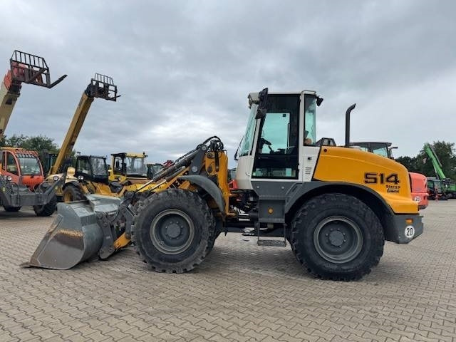 LIEBHERR L 514 - Gumikerekes homlokrakodó: 2 kép. LIEBHERR L 514 - Gumikerekes homlokrakodó: 2 kép.