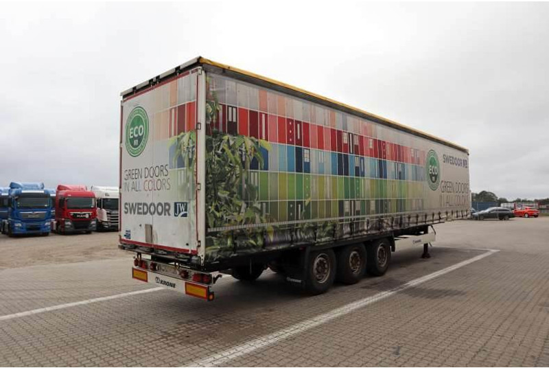 Krone Curtainsider/Planenauflieger/Gardin - Ponyvás félpótkocsi: 3 kép. Krone Curtainsider/Planenauflieger/Gardin - Ponyvás félpótkocsi: 3 kép.