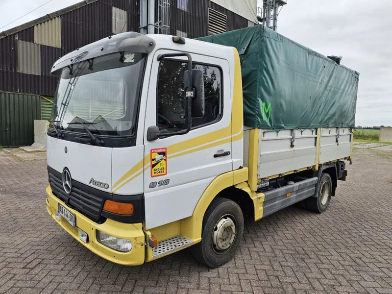 Mercedes-Benz Atego 918 - Ponyvás teherautó: 1 kép. Mercedes-Benz Atego 918 - Ponyvás teherautó: 1 kép.