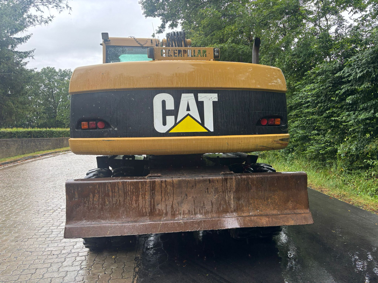 CATERPILLAR M 316 C - Gumikerekes kotró: 5 kép. CATERPILLAR M 316 C - Gumikerekes kotró: 5 kép.