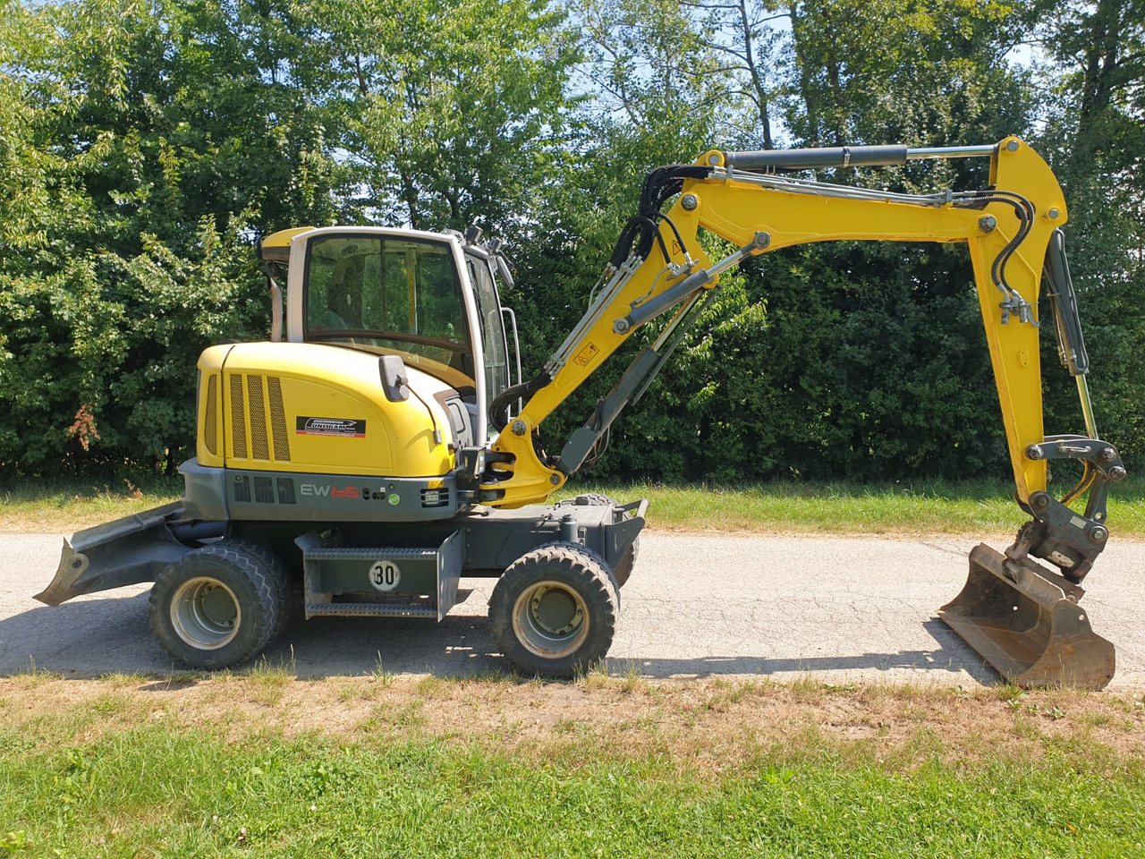 WACKER Neuson EW 65 - Gumikerekes kotró: 2 kép. WACKER Neuson EW 65 - Gumikerekes kotró: 2 kép.