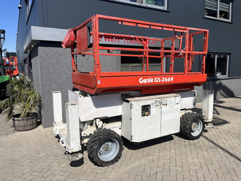 Genie GS 2669 RT Hoogwerker / arbeitsbuhne - Ollós emelő: 2 kép. Genie GS 2669 RT Hoogwerker / arbeitsbuhne - Ollós emelő: 2 kép.