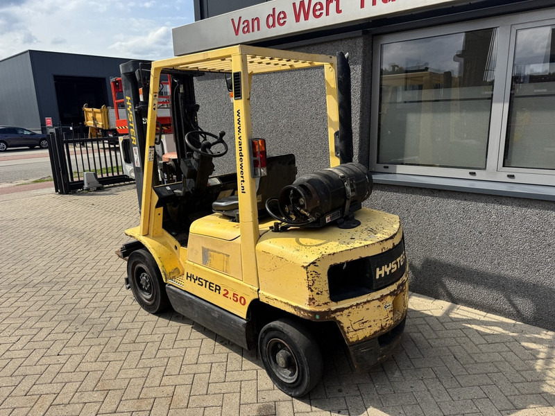 Hyster H2.50XM Triplo 470 Freelift / Sideshift LPG 1995 - Gázüzemű targonca: 5 kép. Hyster H2.50XM Triplo 470 Freelift / Sideshift LPG 1995 - Gázüzemű targonca: 5 kép.
