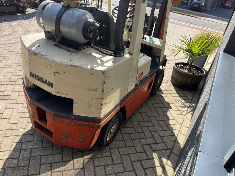 Nissan FG35U heftruck dulpo310 freelift 3e functie LPG COMPACT - Gázüzemű targonca: 4 kép. Nissan FG35U heftruck dulpo310 freelift 3e functie LPG COMPACT - Gázüzemű targonca: 4 kép.