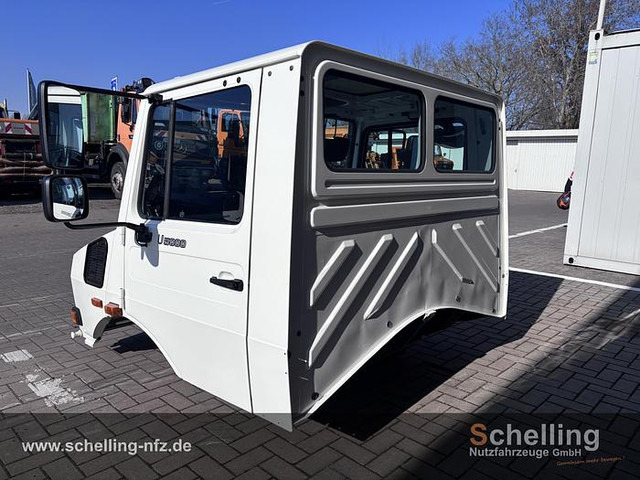 Mercedes-Benz Unimog UHN - Teherautó: 4 kép. Mercedes-Benz Unimog UHN - Teherautó: 4 kép.