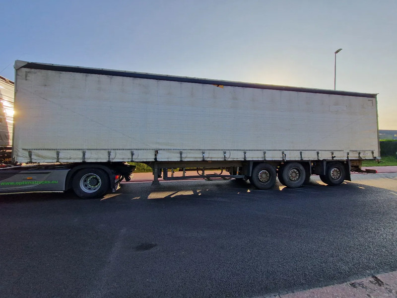 Schmitz Cargobull SCB*S3T / HUBDACH / TOIT LEVANT / HEFDAK /DRAAIAS -ESSIEUX VIRREUR - DREHACHSE - Ponyvás félpótkocsi: 5 kép. Schmitz Cargobull SCB*S3T / HUBDACH / TOIT LEVANT / HEFDAK /DRAAIAS -ESSIEUX VIRREUR - DREHACHSE - Ponyvás félpótkocsi: 5 kép.