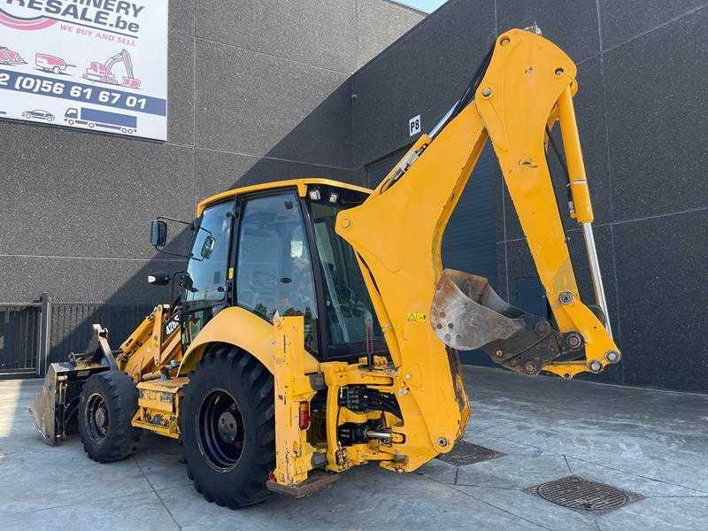 Caterpillar 428F - Kotrórakodó: 2 kép. Caterpillar 428F - Kotrórakodó: 2 kép.