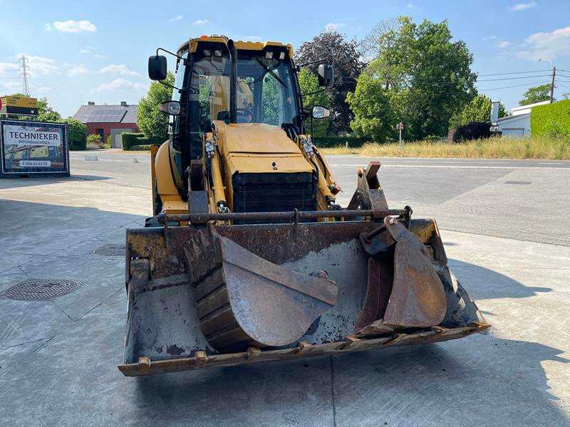 Caterpillar 428F - Kotrórakodó: 4 kép. Caterpillar 428F - Kotrórakodó: 4 kép.