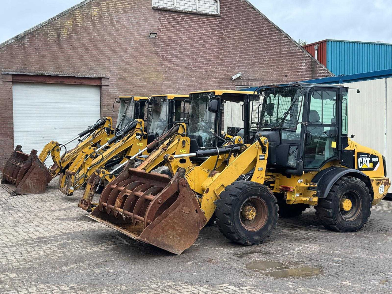 Caterpillar 908  908 908H 906 wegens contractbreuk - Gumikerekes homlokrakodó: 3 kép. Caterpillar 908  908 908H 906 wegens contractbreuk - Gumikerekes homlokrakodó: 3 kép.