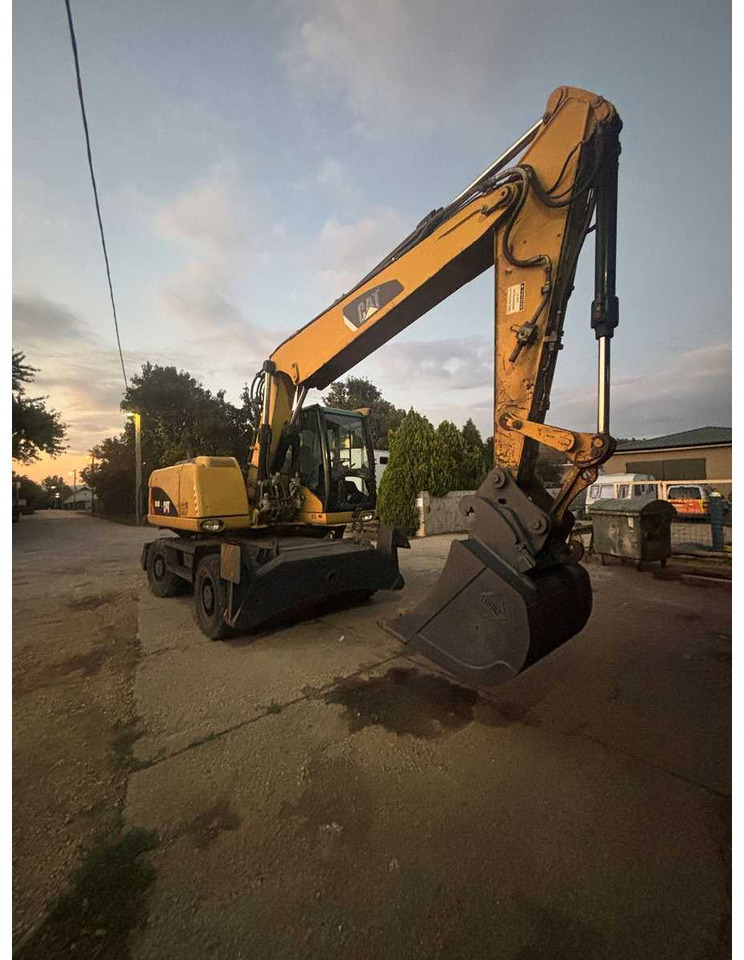 Caterpillar CATERPILLAR - M316D - WHEELED EXCAVATOR - 2008 - Gumikerekes kotró: 3 kép. Caterpillar CATERPILLAR - M316D - WHEELED EXCAVATOR - 2008 - Gumikerekes kotró: 3 kép.