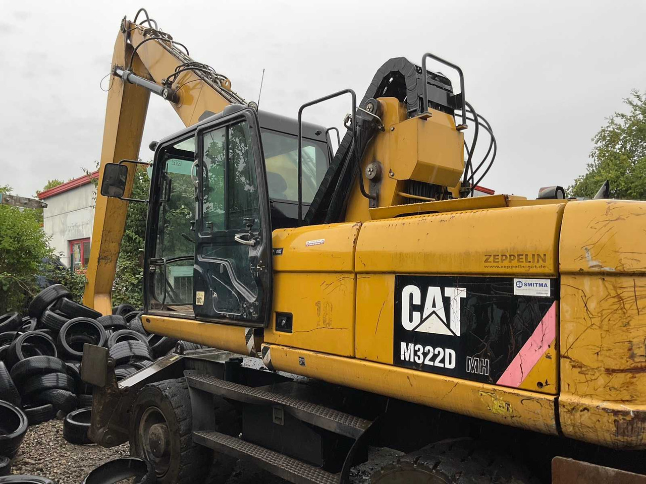 Caterpillar M 322D MH - Kotrórakodó: 3 kép. Caterpillar M 322D MH - Kotrórakodó: 3 kép.