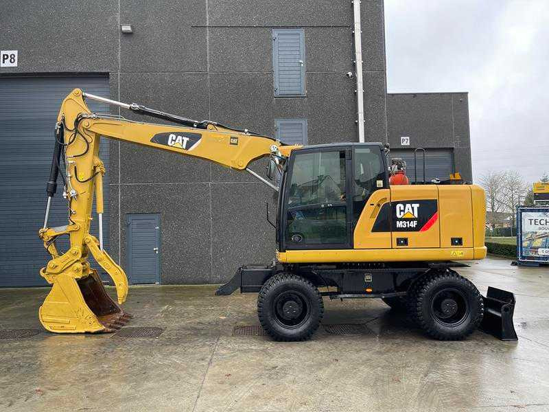 Caterpillar M314F - Gumikerekes kotró: 1 kép. Caterpillar M314F - Gumikerekes kotró: 1 kép.
