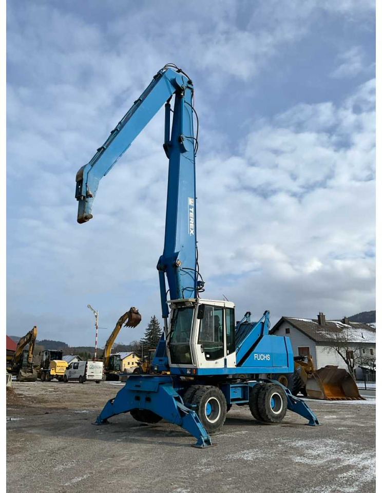 Fuchs MHL350 - Gumikerekes kotró: 2 kép. Fuchs MHL350 - Gumikerekes kotró: 2 kép.