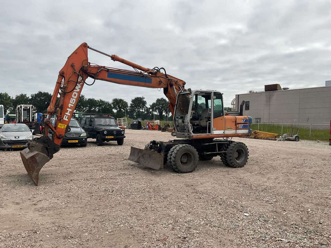 Hitachi FH 150W.3 - Autódaru: 2 kép. Hitachi FH 150W.3 - Autódaru: 2 kép.