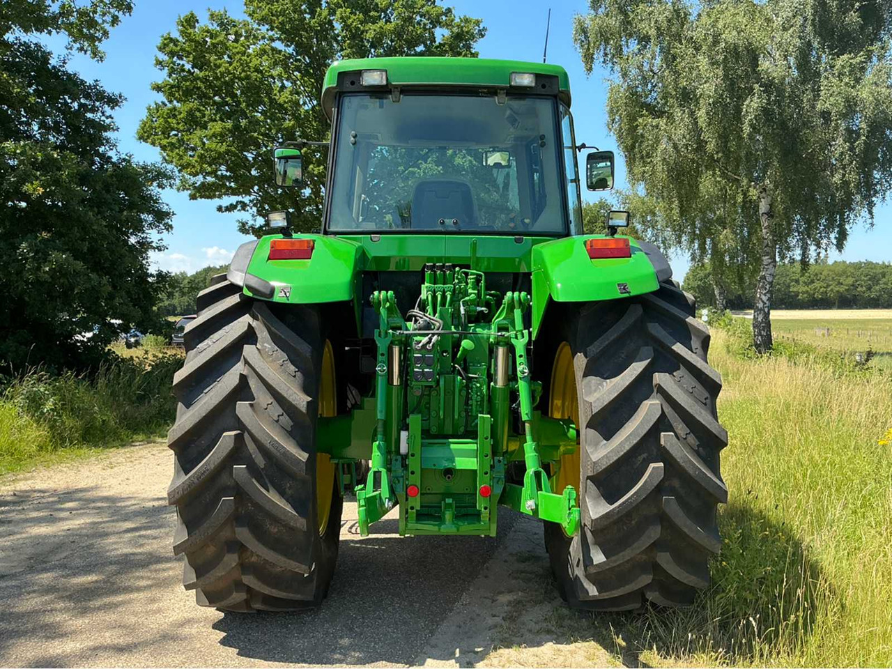 John Deere 7710 - Traktor: 3 kép. John Deere 7710 - Traktor: 3 kép.
