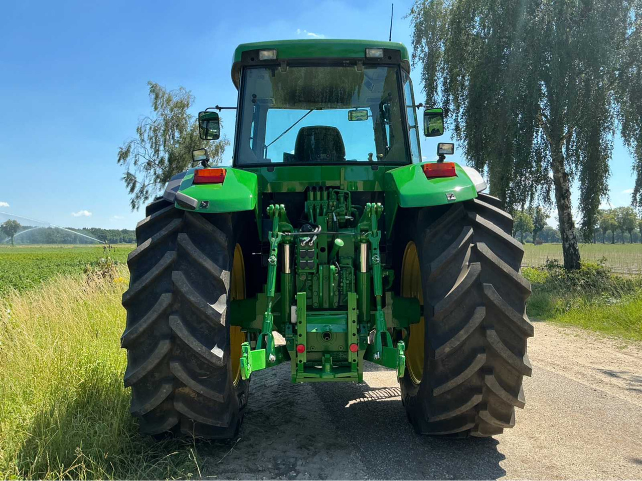 John Deere 7710 - Traktor: 4 kép. John Deere 7710 - Traktor: 4 kép.