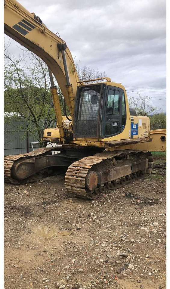 KOMATSU - Lánctalpas kotró: 1 kép. KOMATSU - Lánctalpas kotró: 1 kép.