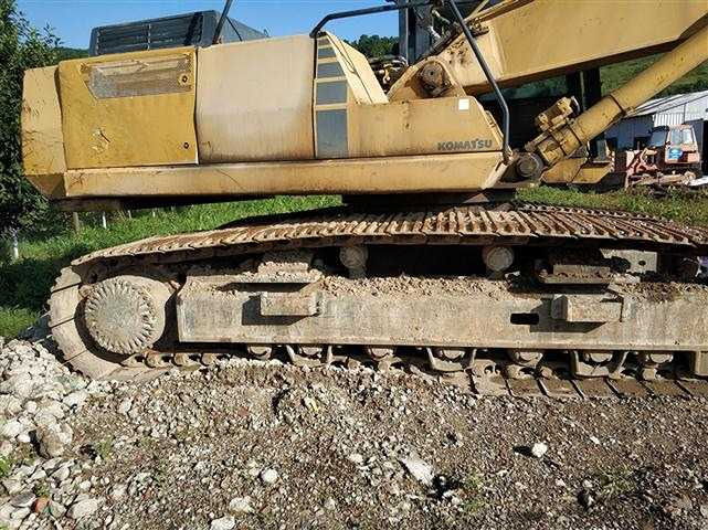 KOMATSU - Gumikerekes kotró: 2 kép. KOMATSU - Gumikerekes kotró: 2 kép.