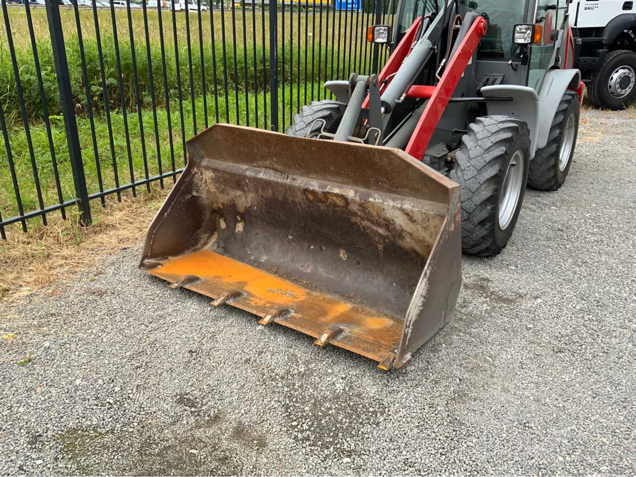 Kramer Allrad 346 - Gumikerekes homlokrakodó: 4 kép. Kramer Allrad 346 - Gumikerekes homlokrakodó: 4 kép.