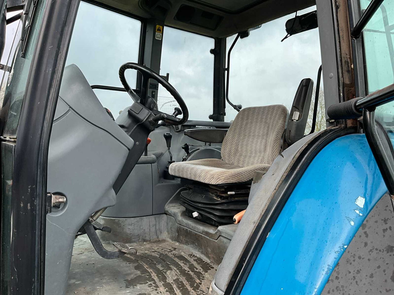 Traktor New Holland TS115: 11 kép.