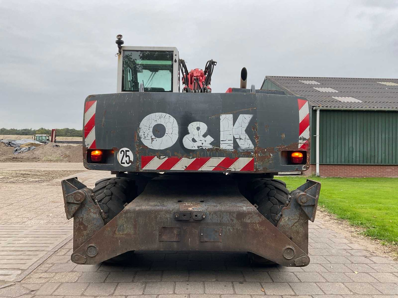 O&K MH Plus - Gumikerekes kotró: 4 kép. O&K MH Plus - Gumikerekes kotró: 4 kép.