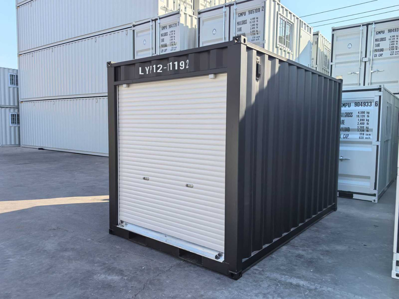 Rhino-cross-containers 12ft met roldeur - Tengeri konténer: 1 kép. Rhino-cross-containers 12ft met roldeur - Tengeri konténer: 1 kép.