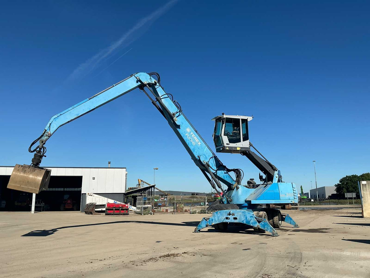 Terex-Fuchs MHL 340 - Gumikerekes kotró: 4 kép. Terex-Fuchs MHL 340 - Gumikerekes kotró: 4 kép.