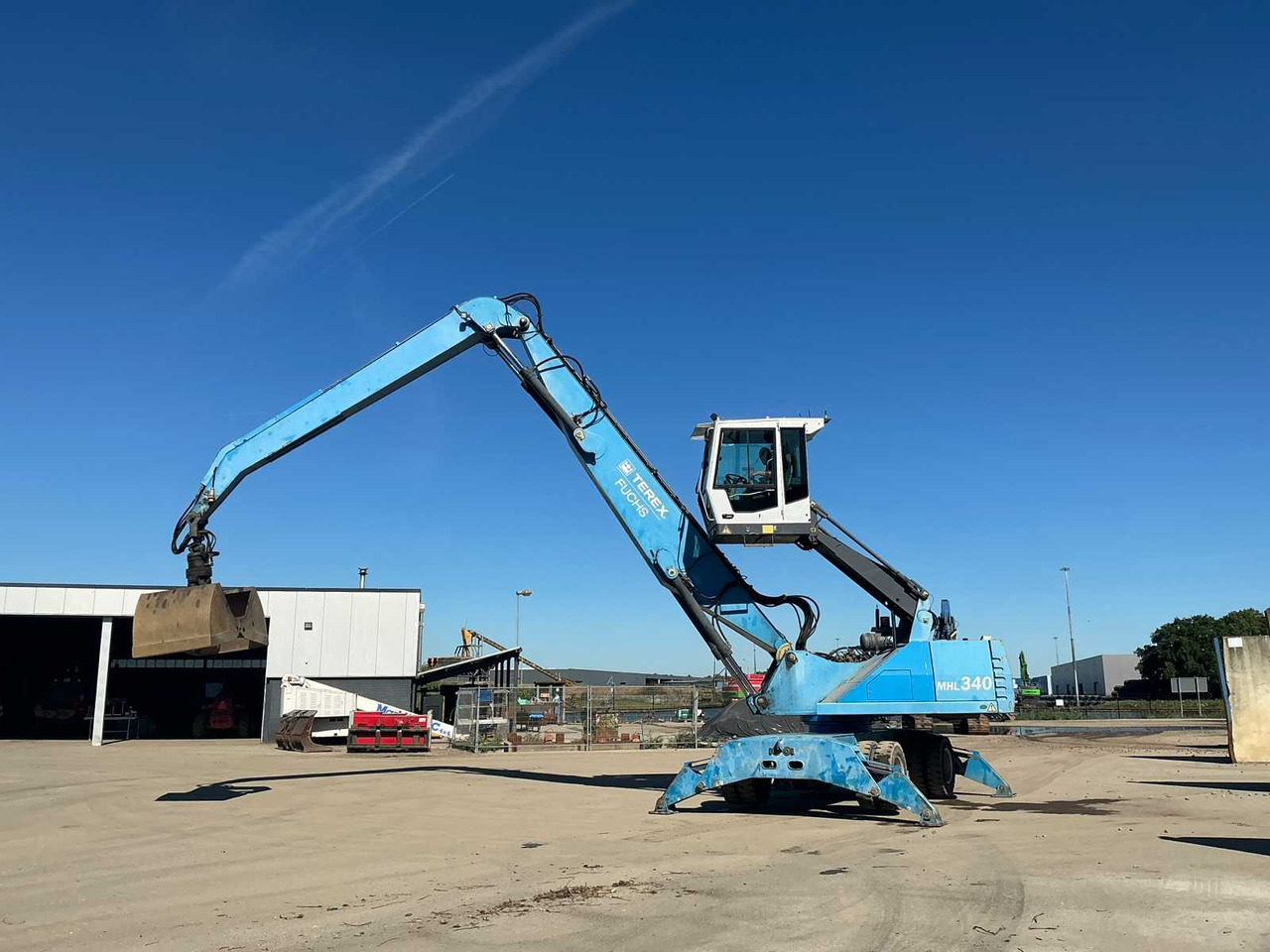 Terex-Fuchs MHL 340 - Gumikerekes kotró: 5 kép. Terex-Fuchs MHL 340 - Gumikerekes kotró: 5 kép.