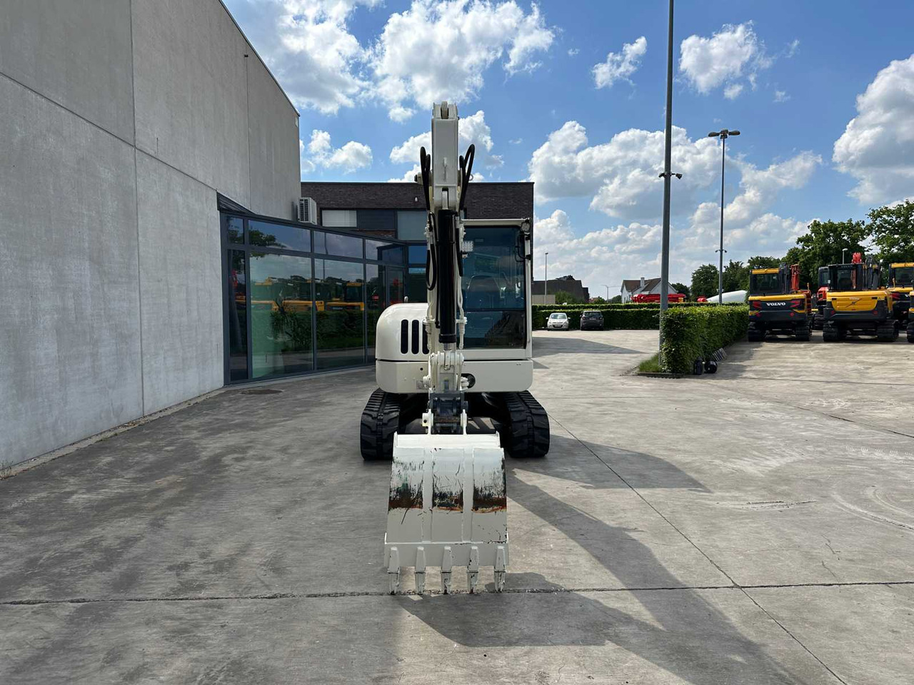 Terex TC60 - Lánctalpas kotró: 2 kép. Terex TC60 - Lánctalpas kotró: 2 kép.