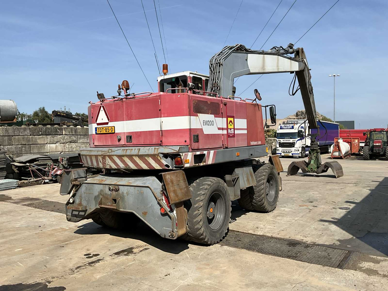 Volvo/Akkerman EW200 - Gumikerekes kotró: 3 kép. Volvo/Akkerman EW200 - Gumikerekes kotró: 3 kép.